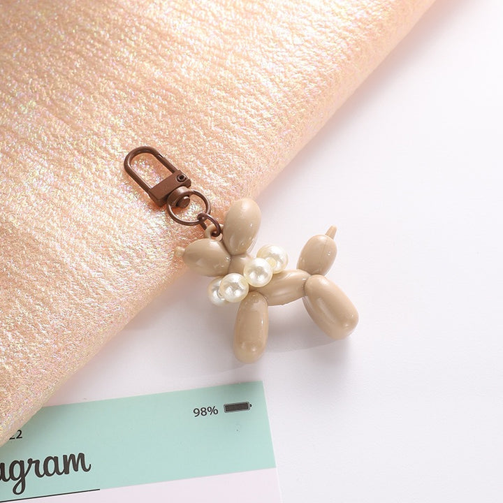 Playful keychain with balloon dog and beads Stornfield