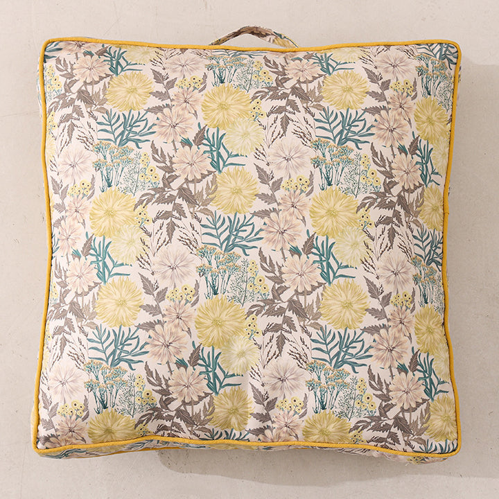 Large decorative seat and floor cushion with floral pattern