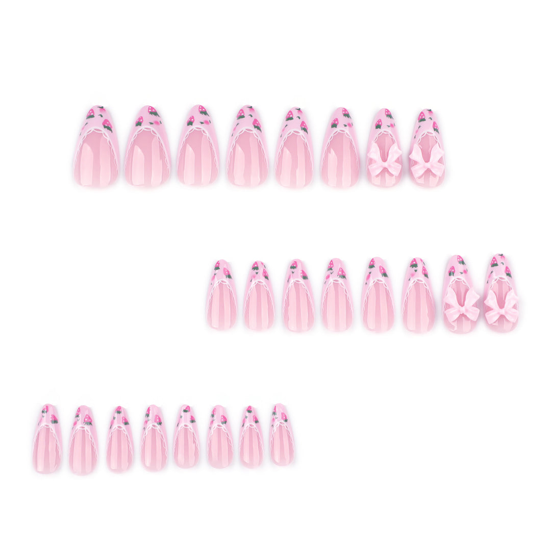Artful stiletto nails with floral accents and bow embellishments Stornfield