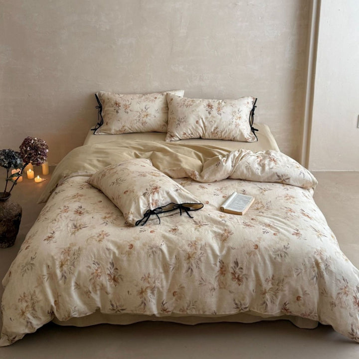 Bedding set made of cotton-linen with delicate watercolor floral print and decorative tying ribbons