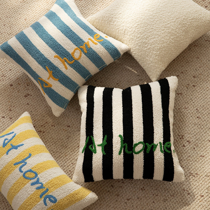 Striped bouclé decorative pillow with embossed loop structure and lettering embroidery Stornfield