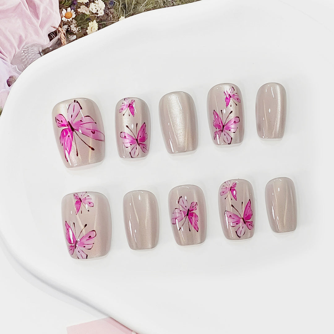 Artistic and elegant artificial nails with butterflies Stornfield