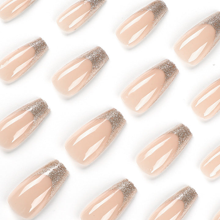Artificial nail art with glitter and transparent design Stornfield