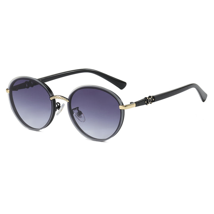 Ladies elegant round sunglasses with mirrored effect Stornfield