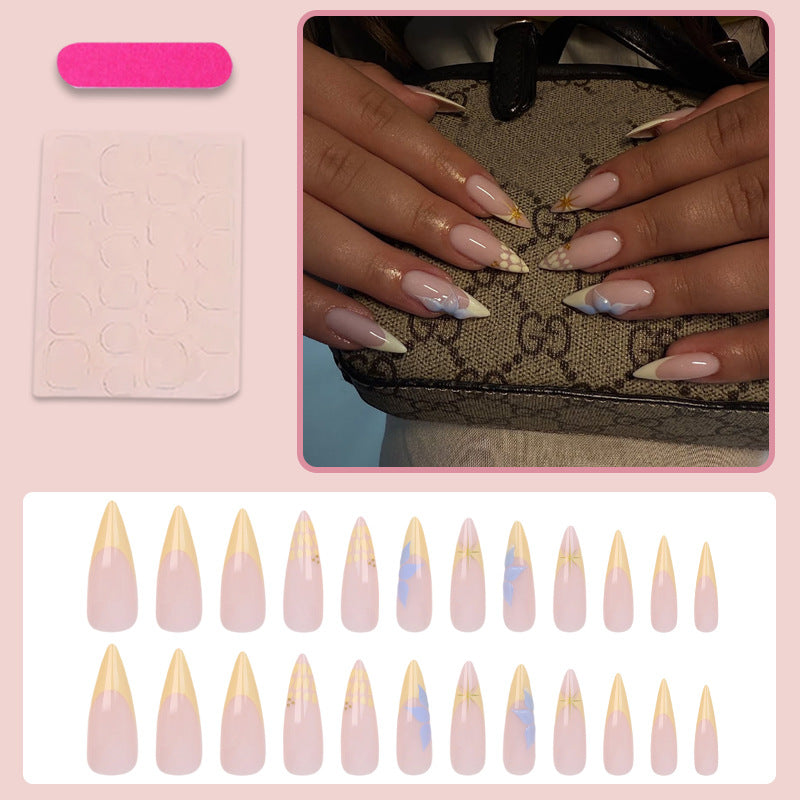 Artificial nail set with elegant floral design and golden accents Stornfield