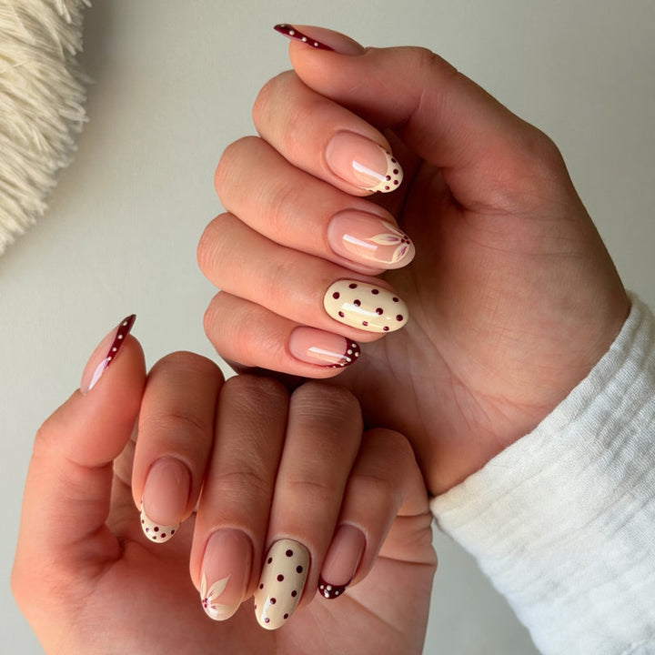 Elegant artificial nails with floral and dotted design Stornfield