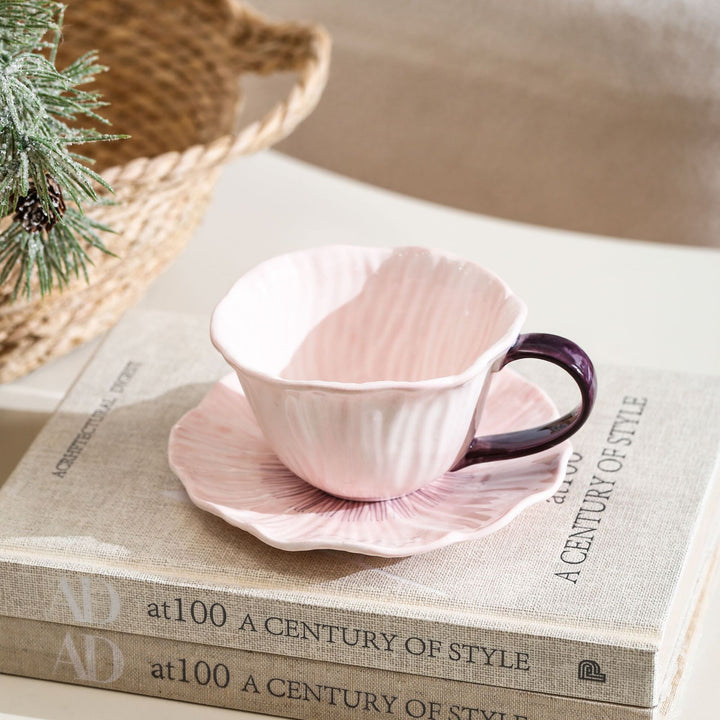 Ceramic mug with saucer in flower shape