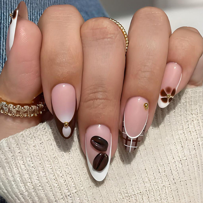 Art nail set with elegant coffee and flower motif Stornfield