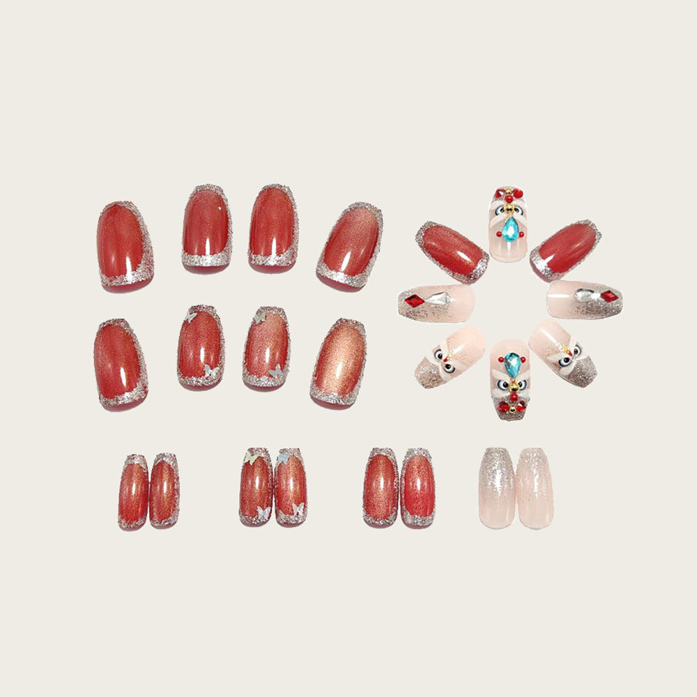 Artificial nails with glitter and gemstone applications Stornfield