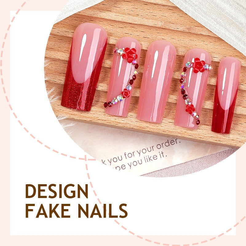 Artificial nail set with decorative accents and glitter Stornfield