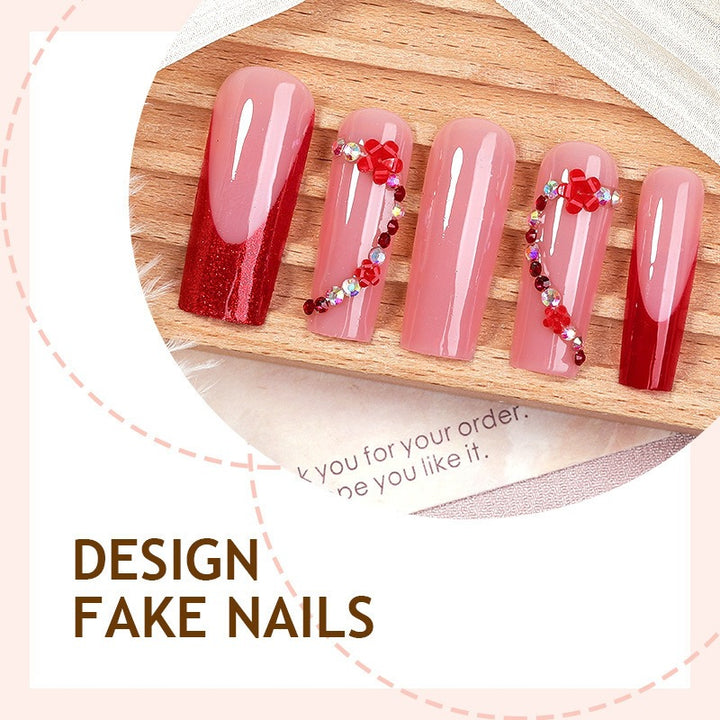 Artificial nail set with decorative accents and glitter Stornfield
