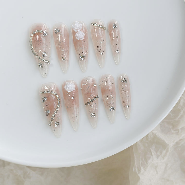 Elegant Stiletto Press-On Nail Art Set with Decorative Floral and Glitter Accents