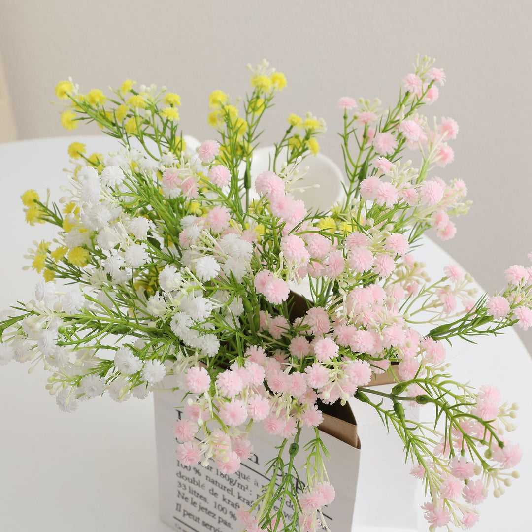 Decorative artificial flower branch with delicate purple flowers