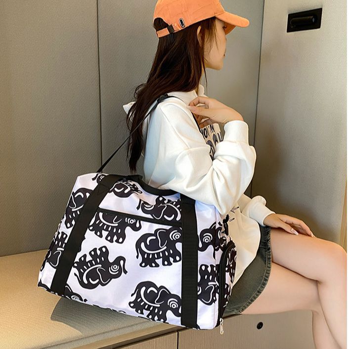 Sporty travel bag with playful elephant pattern Stornfield