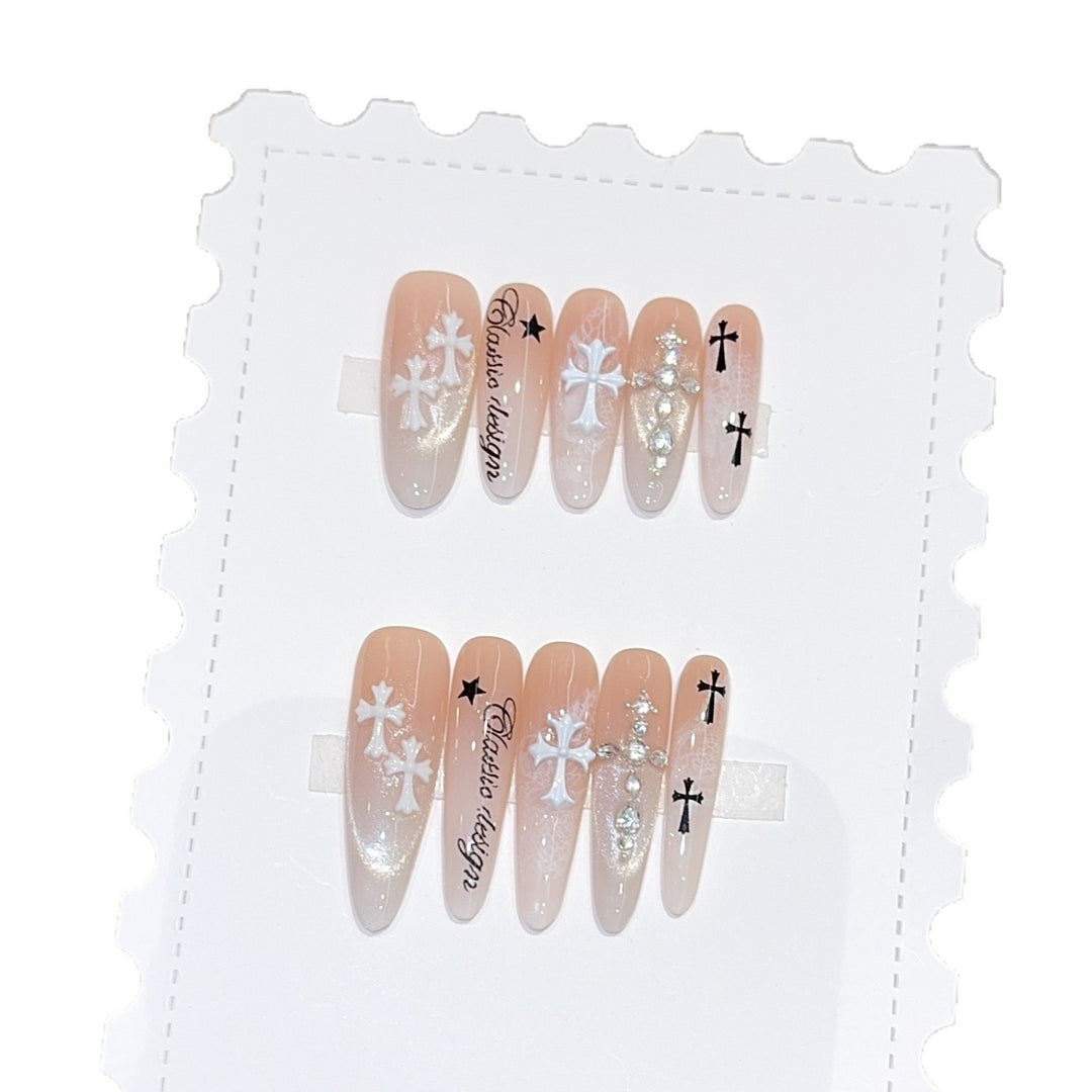 Artificial nail tips with cross and glitter motifs Stornfield