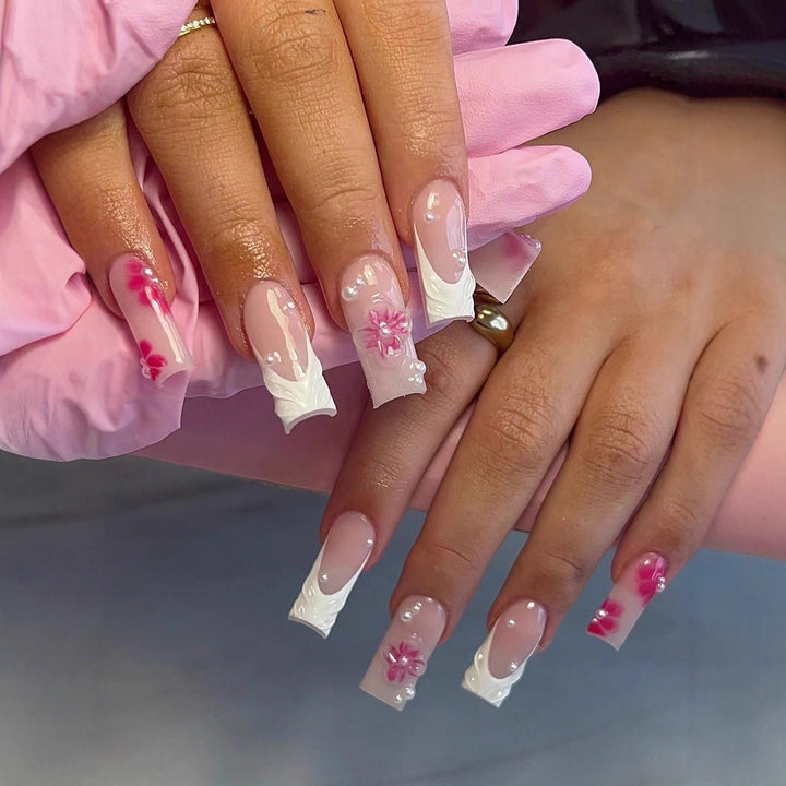 Nail art set with floral 3D decorations and pearl accents Stornfield