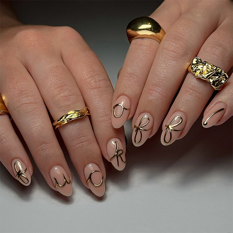 Elegant Press-On Nail Art Set with Stylish Gold Accents Stornfield