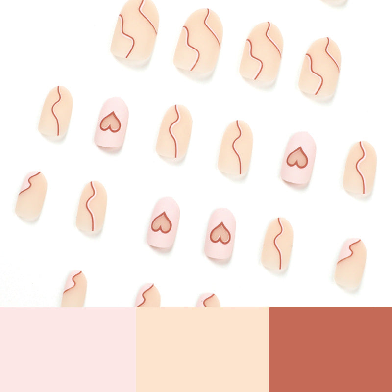 Artful Nail Extensions with Elegant Heart Design Stornfield