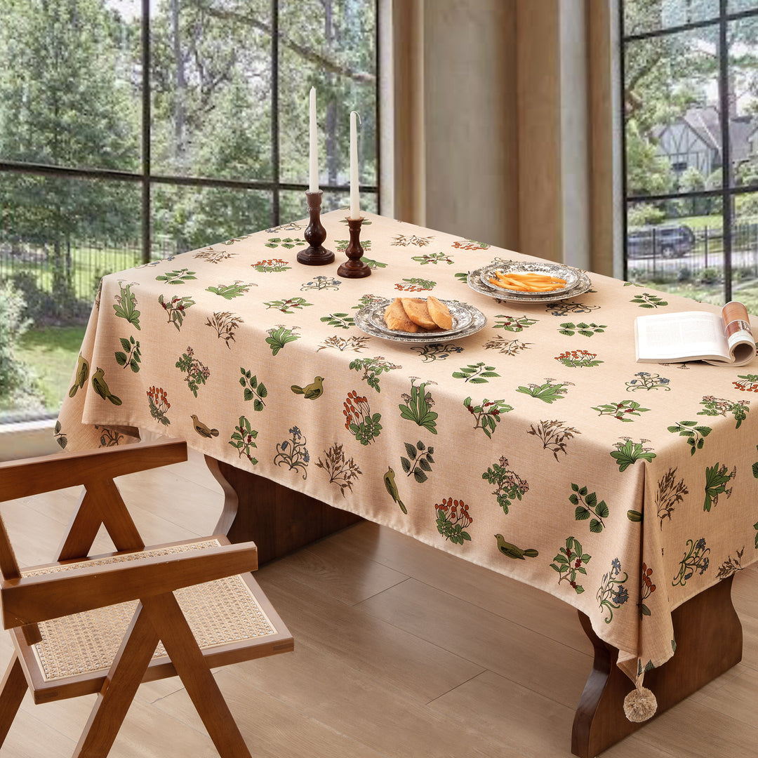 Woven tablecloth with ethnic Aztec pattern and pompom tassels