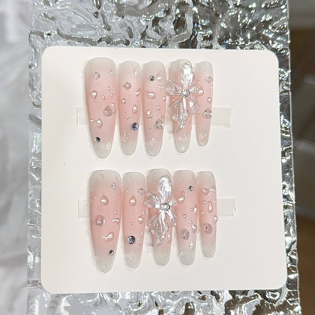 Glamorous artificial nails with sparkling accents Stornfield