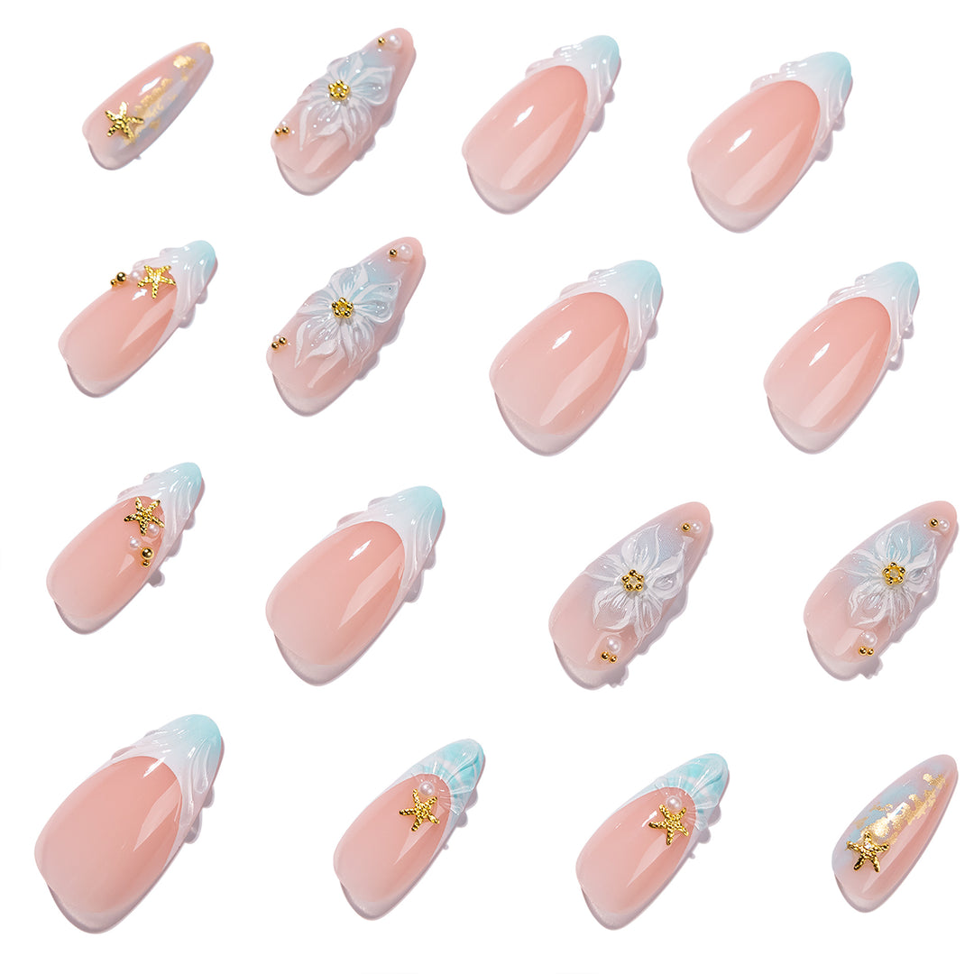 Artful stiletto nails with floral and glamorous accents Stornfield