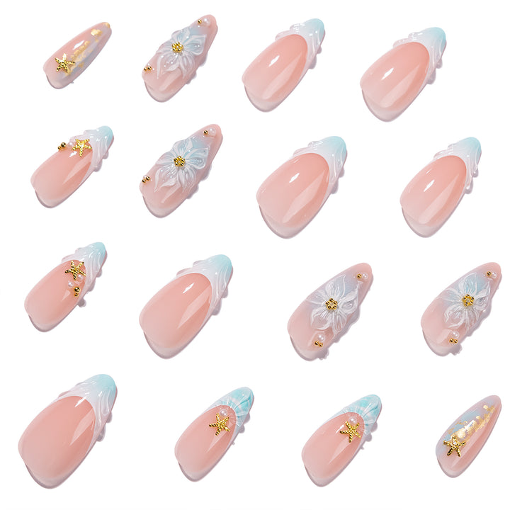 Artful stiletto nails with floral and glamorous accents Stornfield