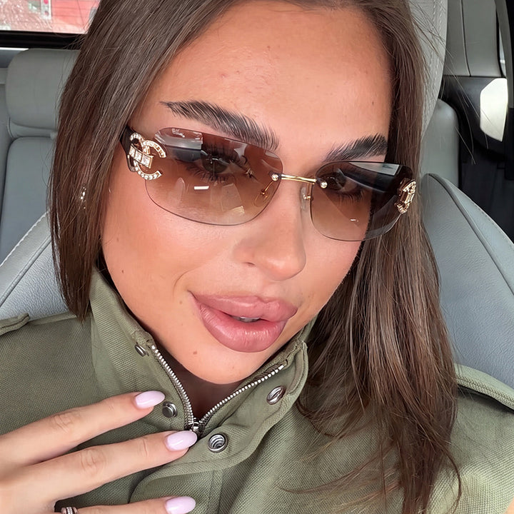 Women's fashionable sunglasses with luxurious geometric frame and protective UV filter Stornfield