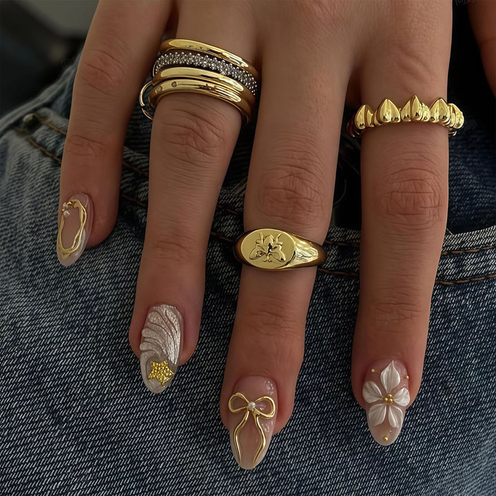 Artistic Press-On Nail Art Set with Decorative Embellishments Stornfield