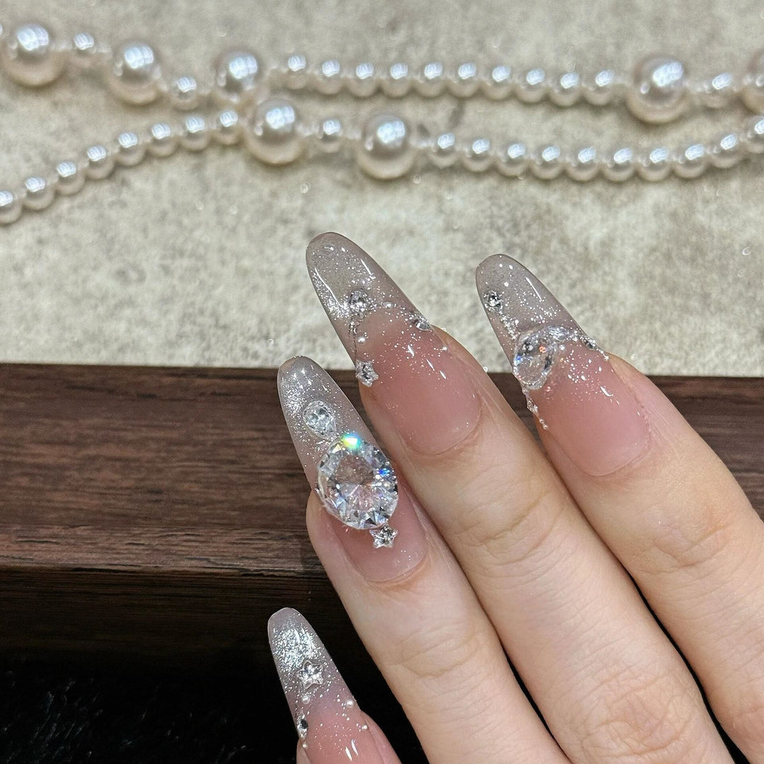 Artificial artificial nails with luxurious glitter and rhinestone design Stornfield