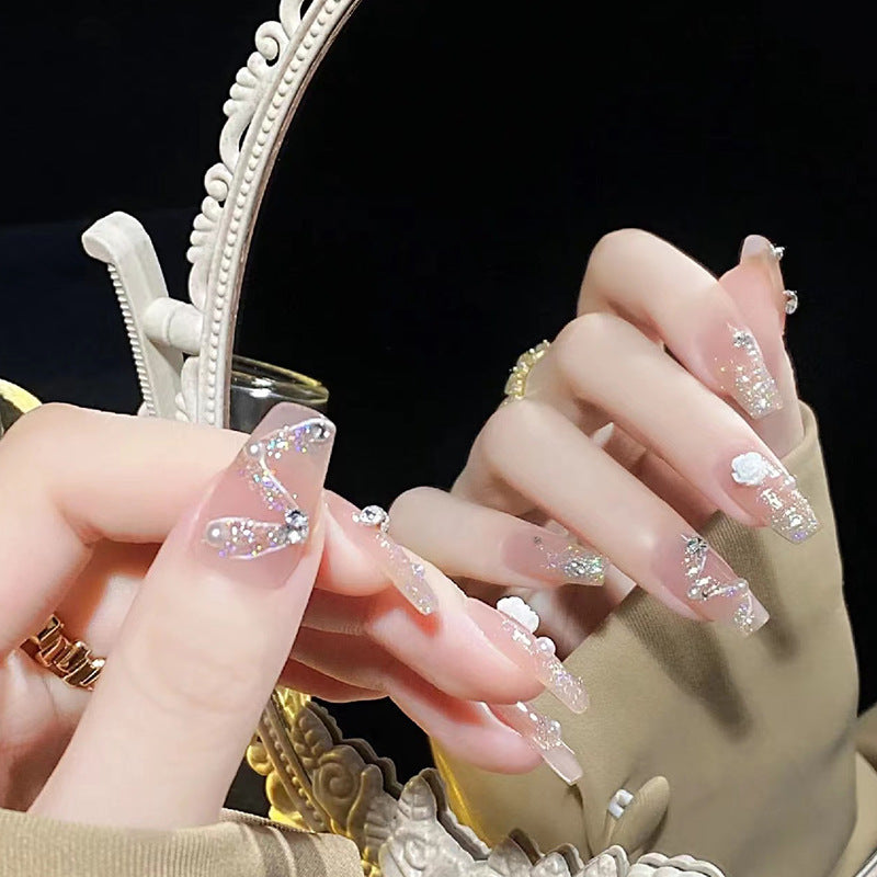Glamorous artificial nails with sparkling accents Stornfield