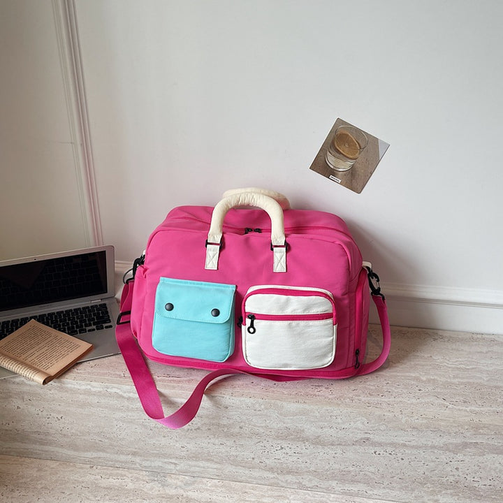 Sporty travel bag with multifunctional outer pockets Stornfield