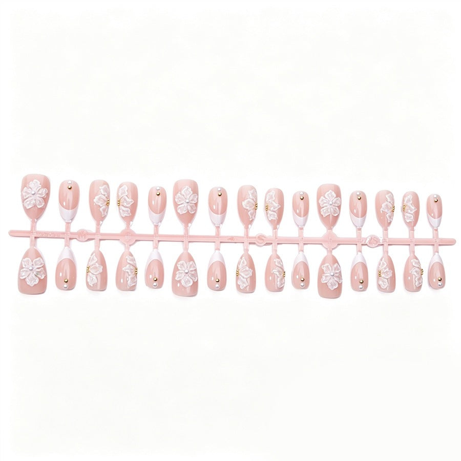 Nail art set with delicate floral patterns and elegant details Stornfield