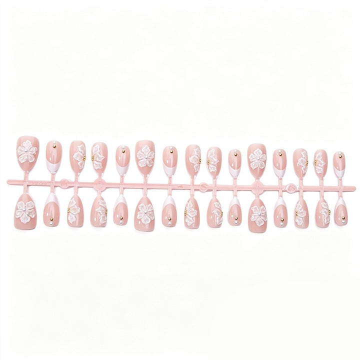 Nail art set with delicate floral patterns and elegant details Stornfield