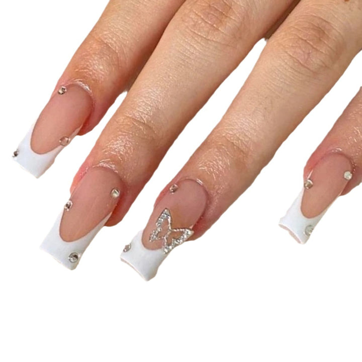 Elegant Stiletto Nail Extensions with Rhinestone Accents Stornfield