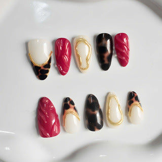 Decorative Stiletto Press-On Nail Set with Artistic Patterns Stornfield
