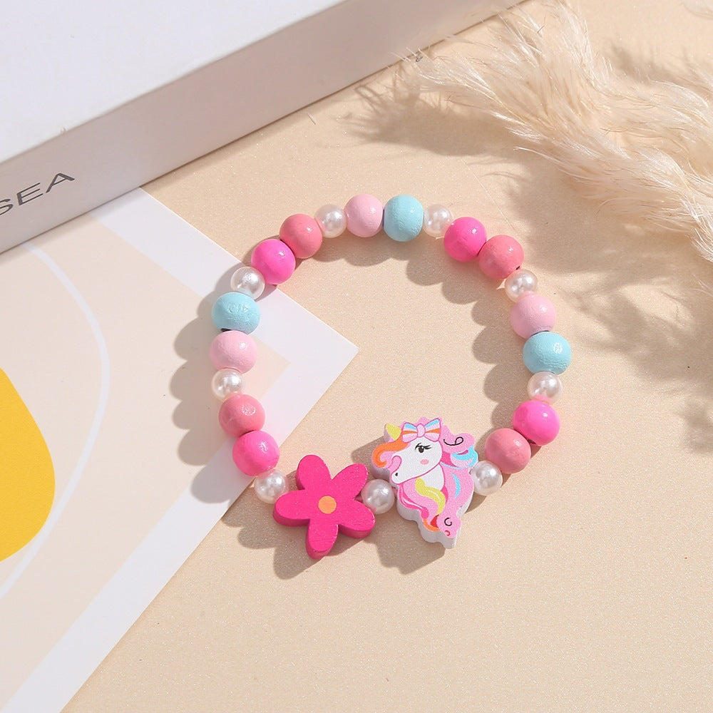 Playful children's bracelet with unicorn and flower motif Stornfield