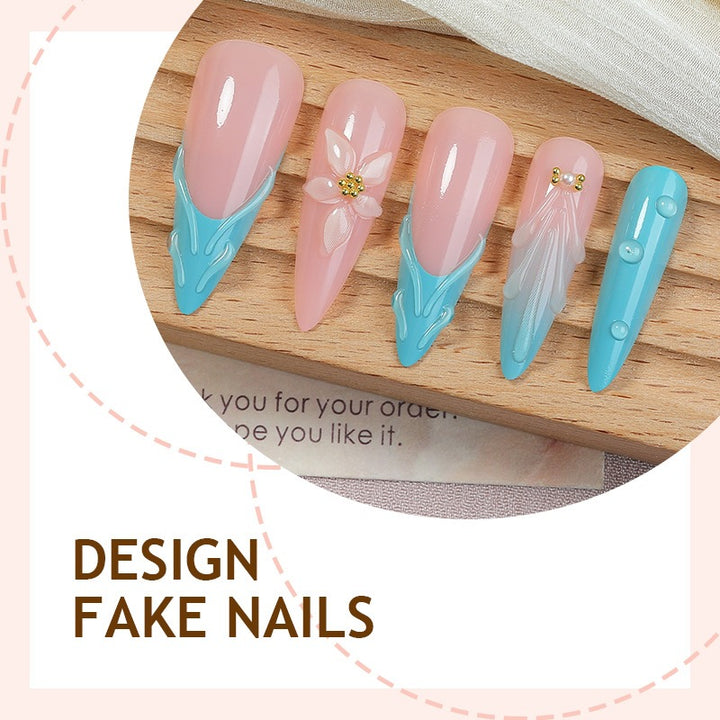 Nail set with filigree designs Stornfield