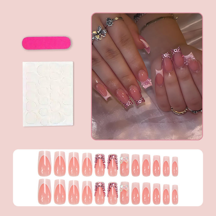 Artificial nail set with elegant glitter accents and modern designs Stornfield