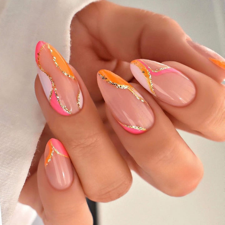Artificial nail creation with glamorous tips and glitter details Stornfield