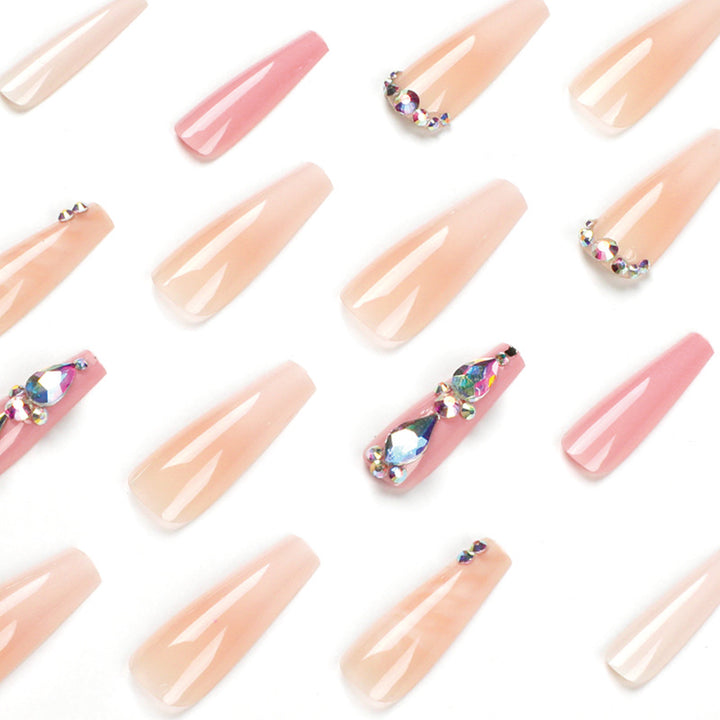 Glamorous artificial nails with gemstone embellishments Stornfield