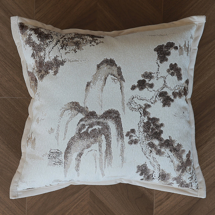Elegant decorative pillow with intricate landscape illustration