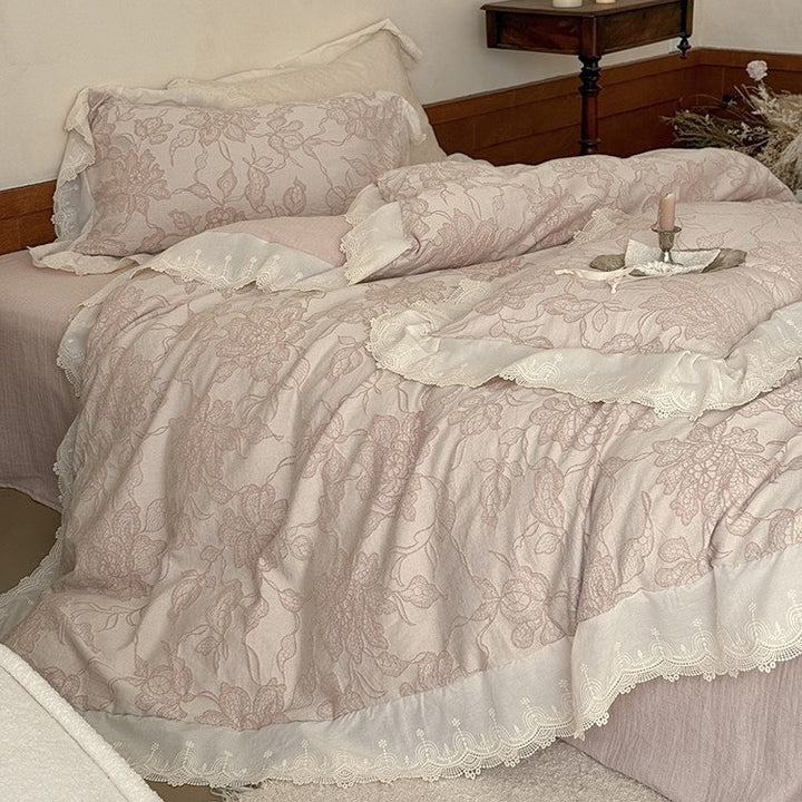 Jacquard bedding set with floral relief pattern and lace border
