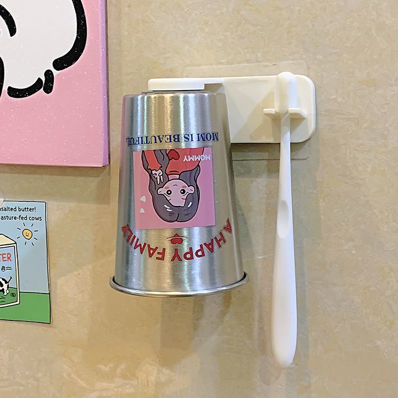 Wall-mounted cup with playful design Stornfield