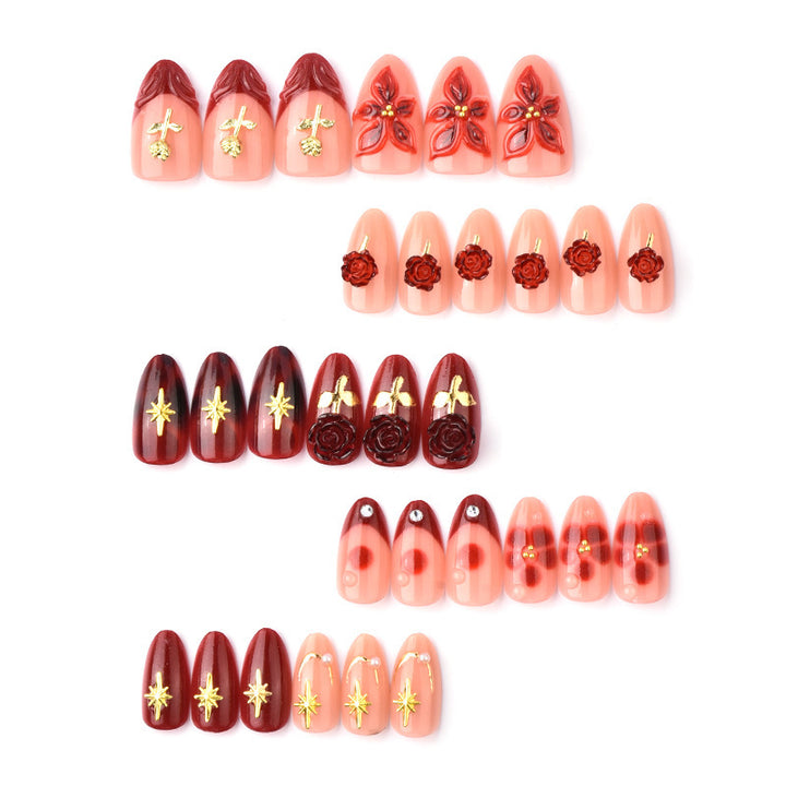 Artificial nail set with elegant floral applications and glamorous accents Stornfield