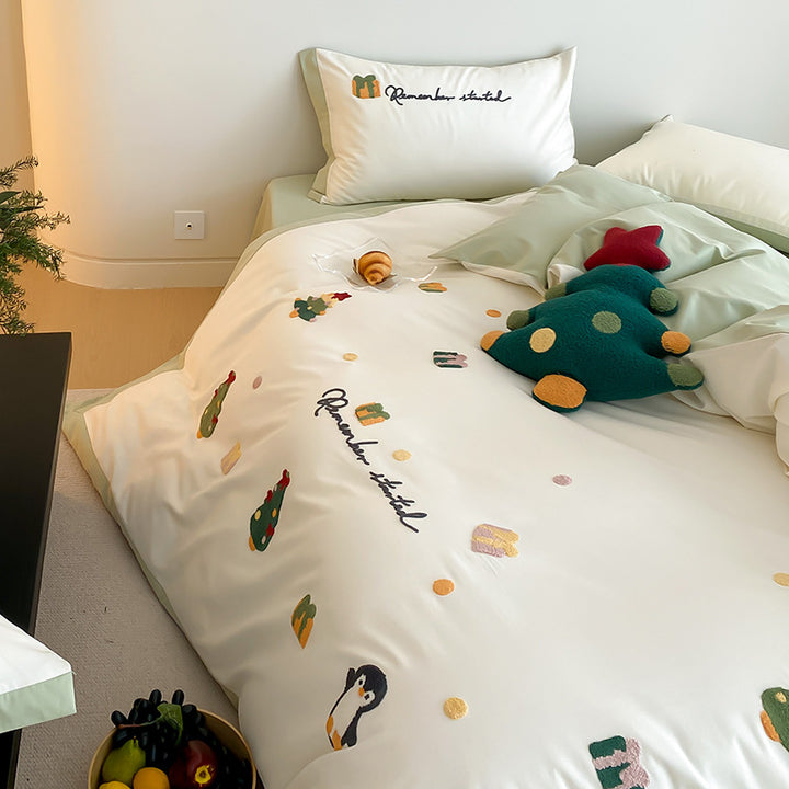 Festive Embroidered Cotton Sateen Duvet Cover and Sham Set with Playful Penguin Motifs and Reversible Border