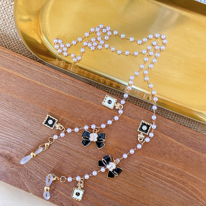 Fashionable glasses holder chain with pearls and pendants Stornfield