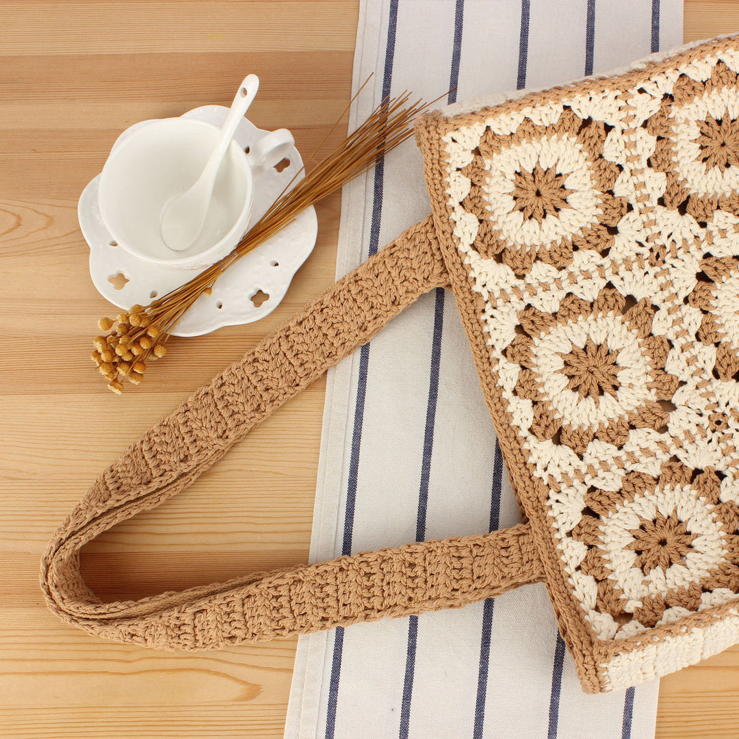 Fashionable crochet handbag with unique flower design Stornfield