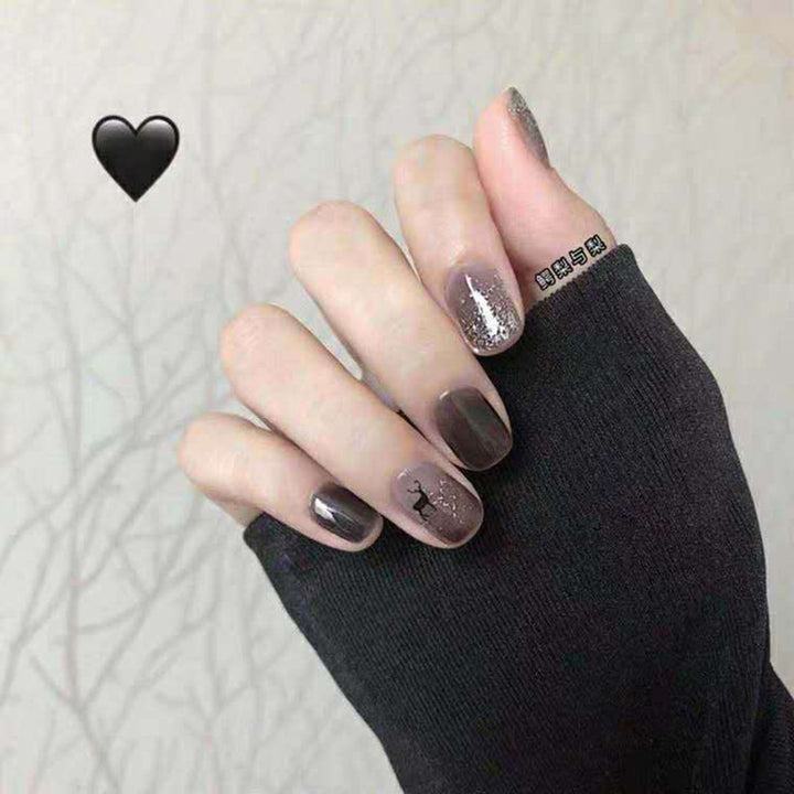 Artful nail extensions with an elegant leaf pattern Stornfield