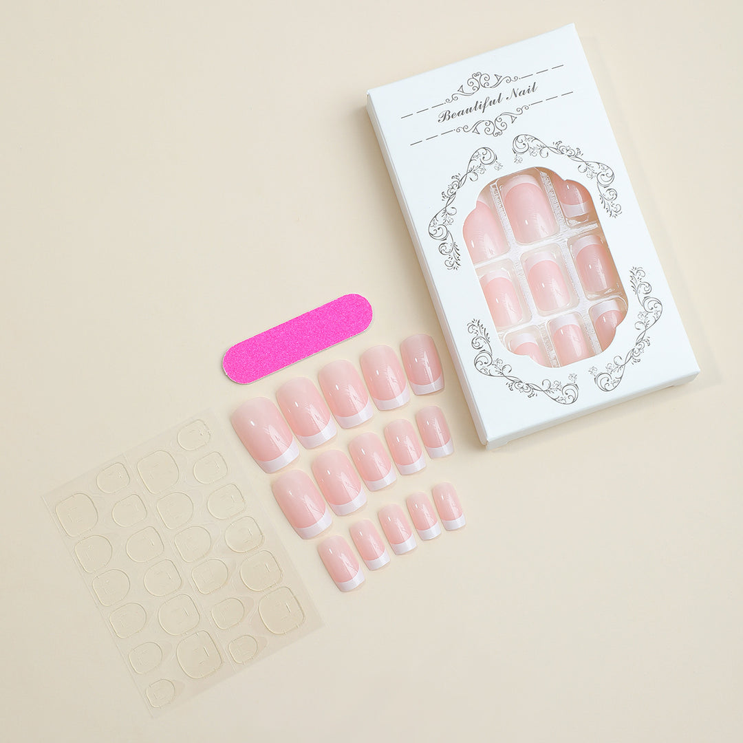 Artificial nail set with elegant French tip decorations Stornfield