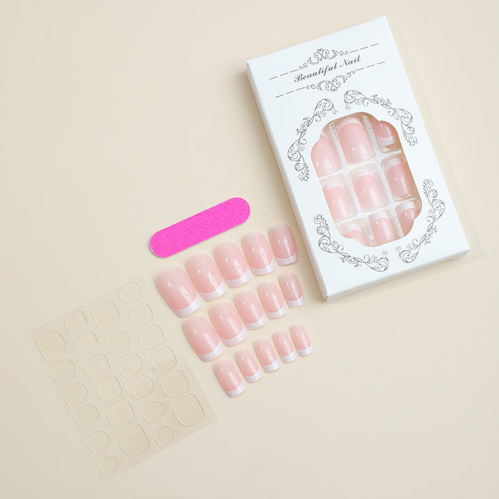 Artificial nail set with elegant French tip decorations Stornfield